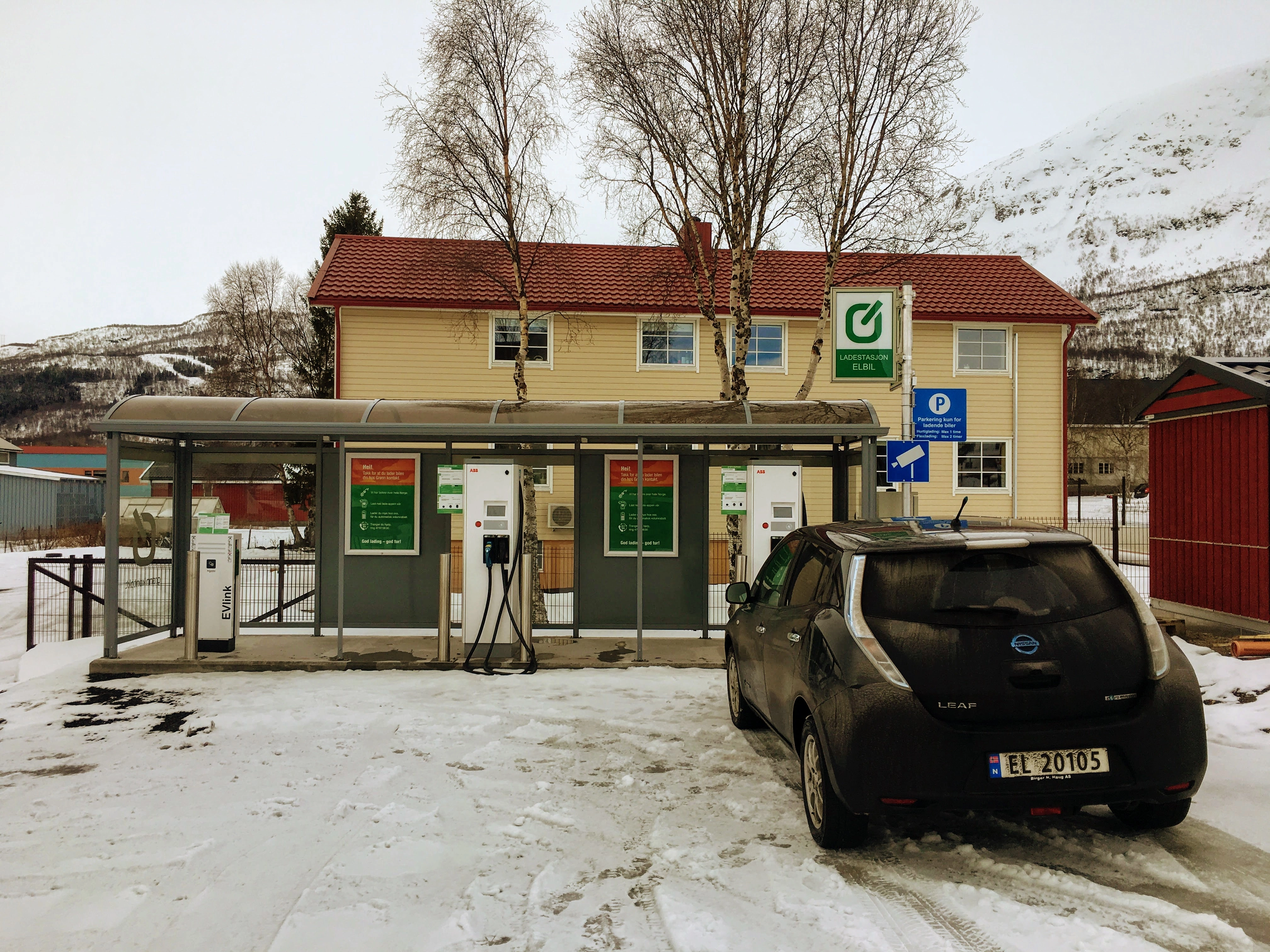 Electric car charging at a Supercharger station in 2015